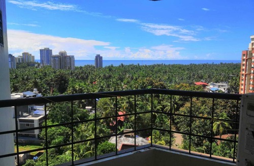 Kannur Apartment | Forget your worries in this spacious and serene space. Wind down RECHARGE !