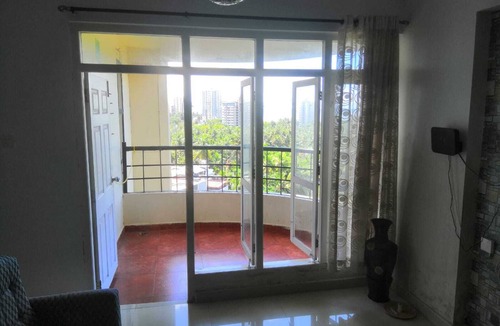 Kannur Apartment | Forget your worries in this spacious and serene space. Wind down RECHARGE !