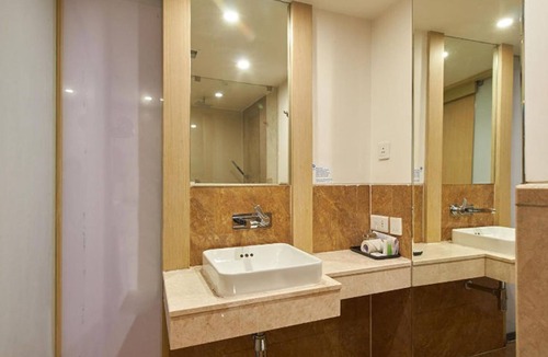 Shenoys Hotel | Ginger Kochi MG Road