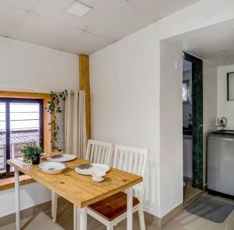 Pali Hill Apartment | Glass House 1BHK in Khar W by SquareOne Stays