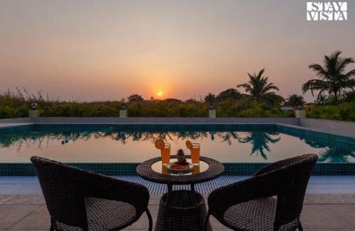 Alibaug Villa | Golden Sunsets by StayVista - Refreshing pool, serene lawn - your tranquil retreat