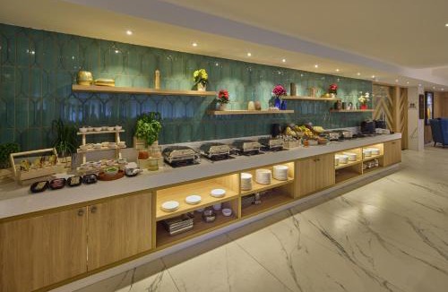 Vyalikaval HBCS Layout Hotel | Grand Continent Hebbal A Sarovar Portico Affiliate Hotel