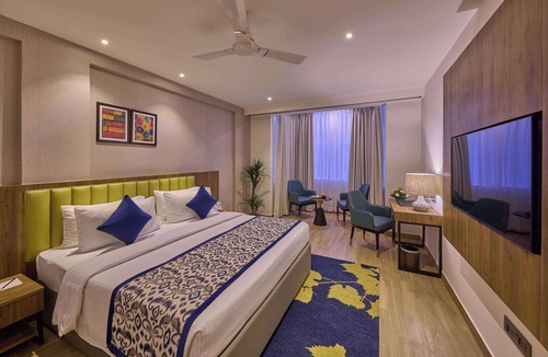 Vyalikaval HBCS Layout Hotel | Grand Continent Hebbal a Sarovar Portico Affiliate Hotel
