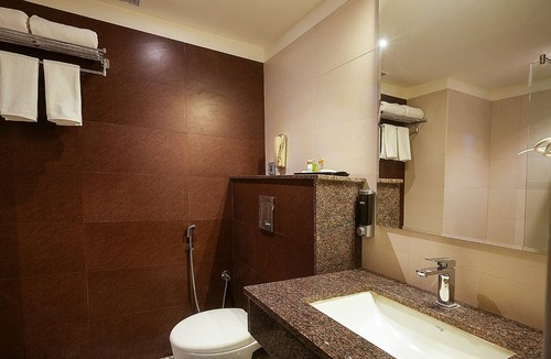 Malleshwaram West Hotel | Grand Continent Malleshwaram A Sarovar Portico Affiliate Hotel
