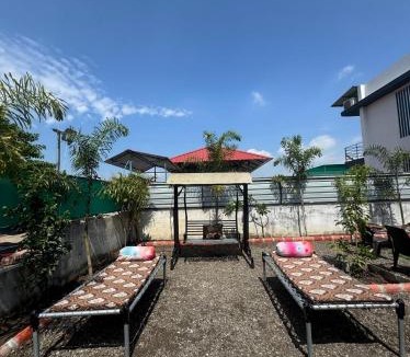 Olpad Villa | Green hevean farm house