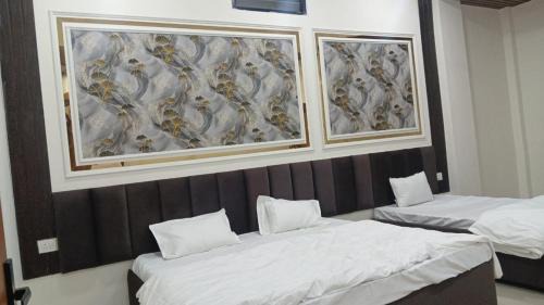 Rau Hotel | Gurukripa rooms rooftop party hall