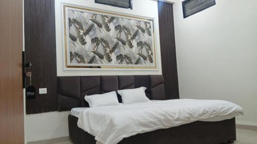 Rau Hotel | Gurukripa rooms rooftop party hall