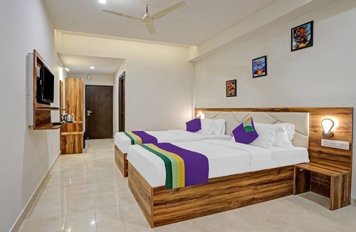 Palm Meadows Hotel | Happy Stays