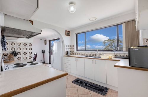 Lakes Entrance House | Harmony: Perched on a slope, this retreat offers views of the ocean