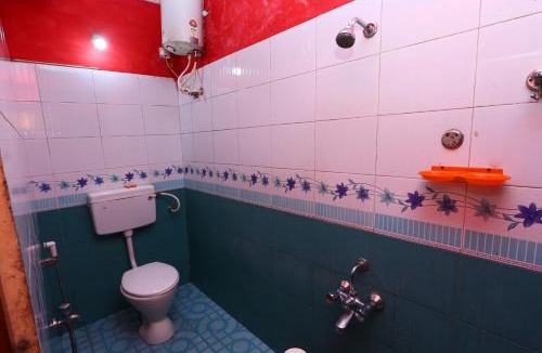 Gudalur Hotel | Hillside Green Valley Comfort Stay