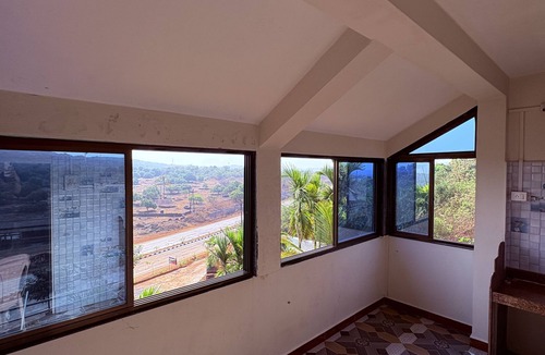 Rajapur House | Homestay offers families a serene hilltop retreat surrounded by nature.
