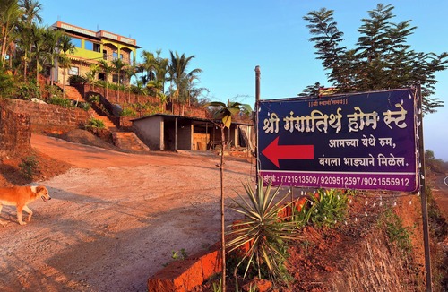Rajapur House | Homestay offers families a serene hilltop retreat surrounded by nature.
