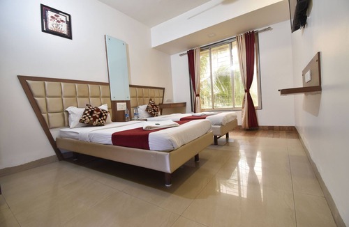 Kamothe Hotel | Hotel Candor Amigo