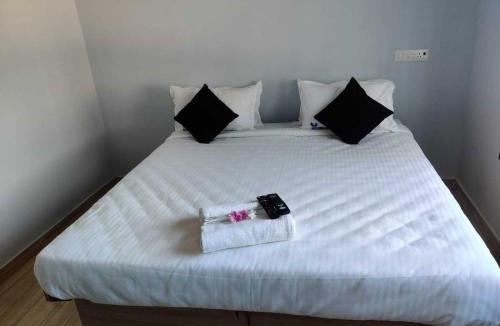 Kottakuppam Hotel | Hotel O CANARIES RETIREES RESIDENCY