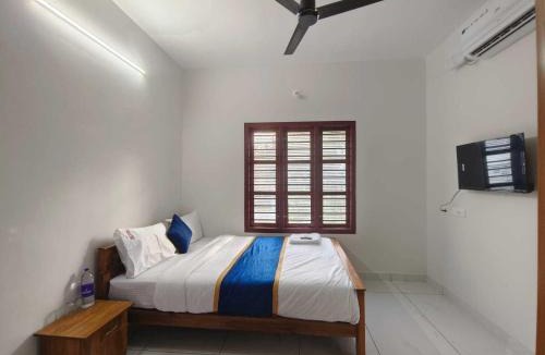 Nedumangad Hotel | Hotel O Rose Garden by Pop Tavern