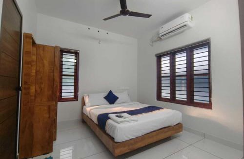Nedumangad Hotel | Hotel O Rose Garden by Pop Tavern