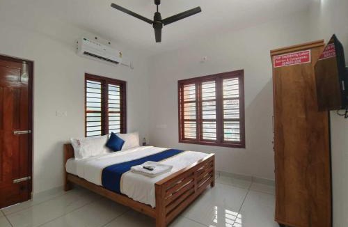 Nedumangad Hotel | Hotel O Rose Garden by Pop Tavern