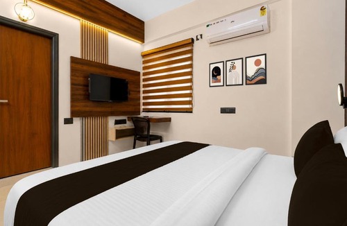 Palm Meadows Hotel | Hotel O Teja Luxe Suites