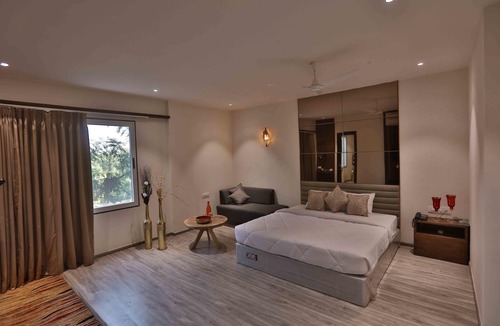 Jalgaon Hotel | Hotel President Cottage Resort