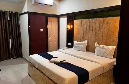 Shenoys Hotel | Hotel Queen Residency