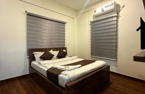 Shenoys Hotel | Indeo Residency