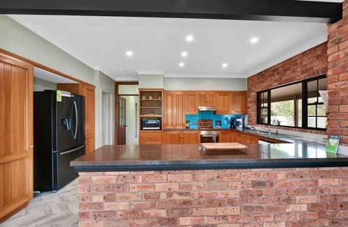 Lovedale House | Ironstone Homestead family private pool and hot spa open fire games room