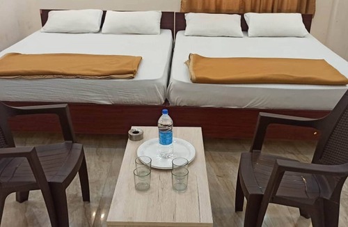 Mandya Hotel | iROOMZ Suchira Lodge