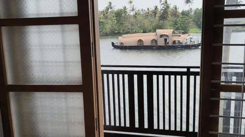 Nedumudy Bed & Breakfast | JMJ Riverview Homestay