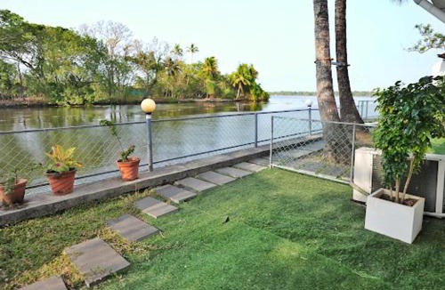 Cherthala House | Kayaloram Retreat by Nexgo Spaces
