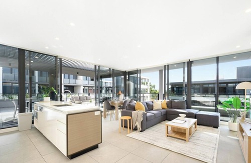 Parramatta Apartment | KozyGuru | Parramatta | Sleek Skyline Retreat