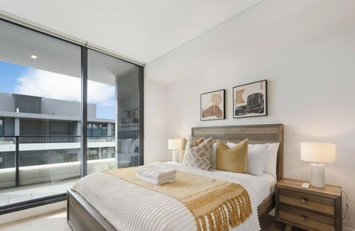Parramatta Apartment | KozyGuru | Parramatta | Sleek Skyline Retreat