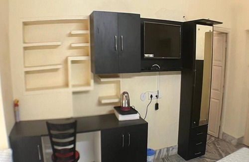 Bhubaneshwar Villa | Kuakhai -Ground floor garden view double bedroom in Bhubaneswar
