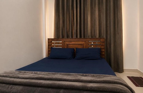Kozhikode House | lQ Rooms