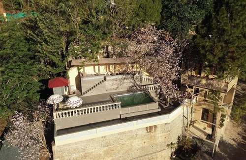 Dharampur Villa | Mansaayan Villas by Aurella Hospitality-3BHK Luxury Valley View Villa in Kasauli with Private Pool, Treehouse & 70 inches Smart TV Bar Lounge