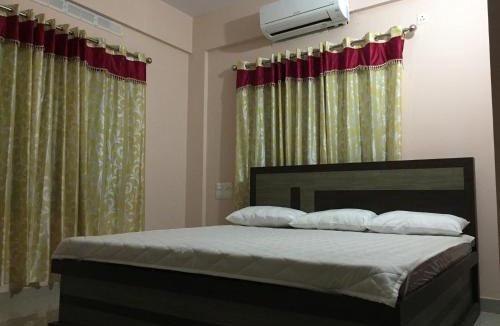 Guruvayur Hotel | Mega Tourist Home