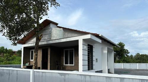 Inna House | Merchant Homestay Cozy Stays & Celebrations