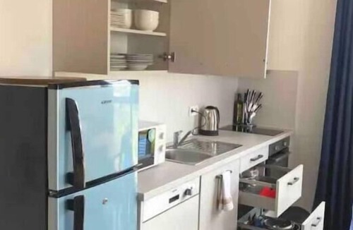 Bwejuu Apartment | Modern 2-bedroom flat with pool & balcony near beach, a digital nomad's favorite