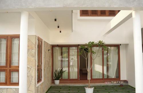 Onamthuruth House | Modern 4BR Home with Attached Bathrooms
