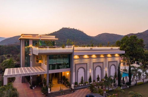 Udaipur District Apartment | Mountain Creek by ELIVAAS Prive Pet-friendly 1 Luxe Room with Shared Pool and Gazebo