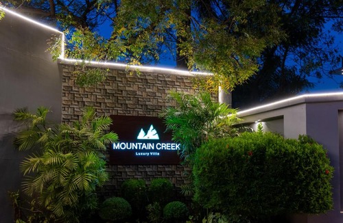 Udaipur District Apartment | Mountain Creek by ELIVAAS Prive Pet-friendly 1 Luxe Room with Shared Pool and Gazebo