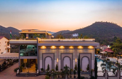 Udaipur District Apartment | Mountain Creek by ELIVAAS Prive Pet-friendly 1 Luxe Room with Shared Pool and Gazebo