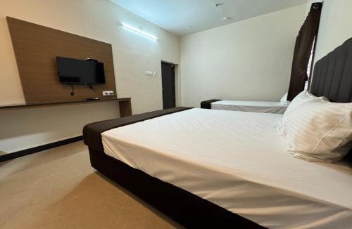 Udumalaipettai Hotel | Nandha Grande Elite
