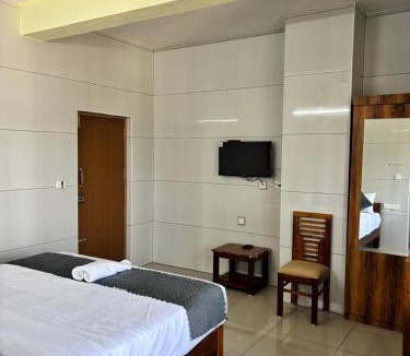 Suntikoppa Hotel | Nest Inn