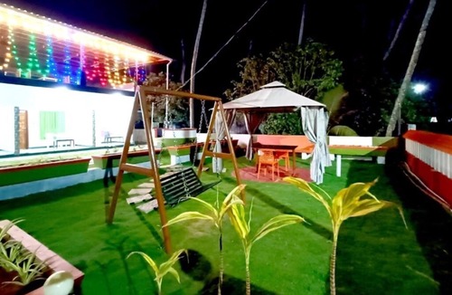 Poovar House | Ocean Queen Palace Poovar – Double Room with Tranquil Garden Views