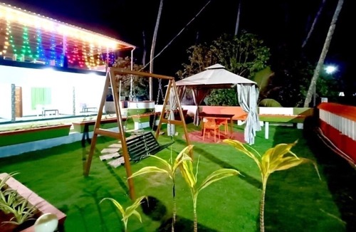 Poovar House | Ocean Queen Palace Poovar – Queen Room with Peaceful Garden Views