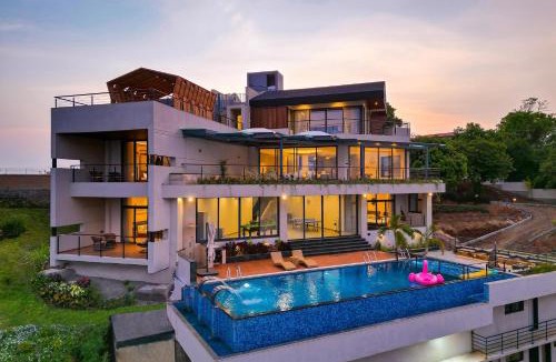 Igatpuri Villa | Pearl Lakeview Mansion by StayVista - Lakeside villa with Infinity pool, In-house theatre & Games room