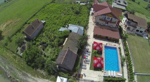 Maliuc House | Pensiunea HARTTAS