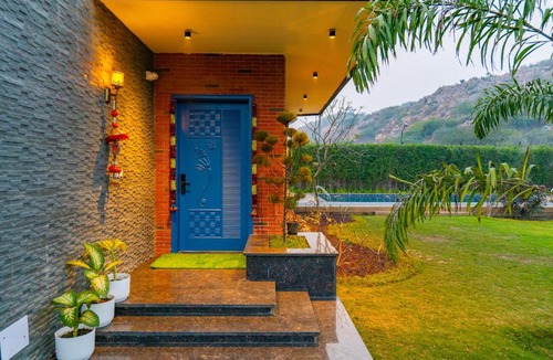 Gurugram Villa | Prassanam Vatika 2-BHK Hillside Villa with Private Pool & Expansive 1-Acre Garden