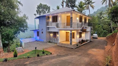 Todupulai Villa | Premium Resort with Pool Campfire tent stay and Games between munnar & Idukki