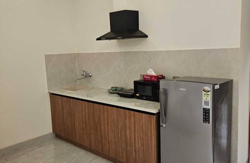 DLF Phase 5 Hotel | Premium Studio with Balcony and Kitchenette